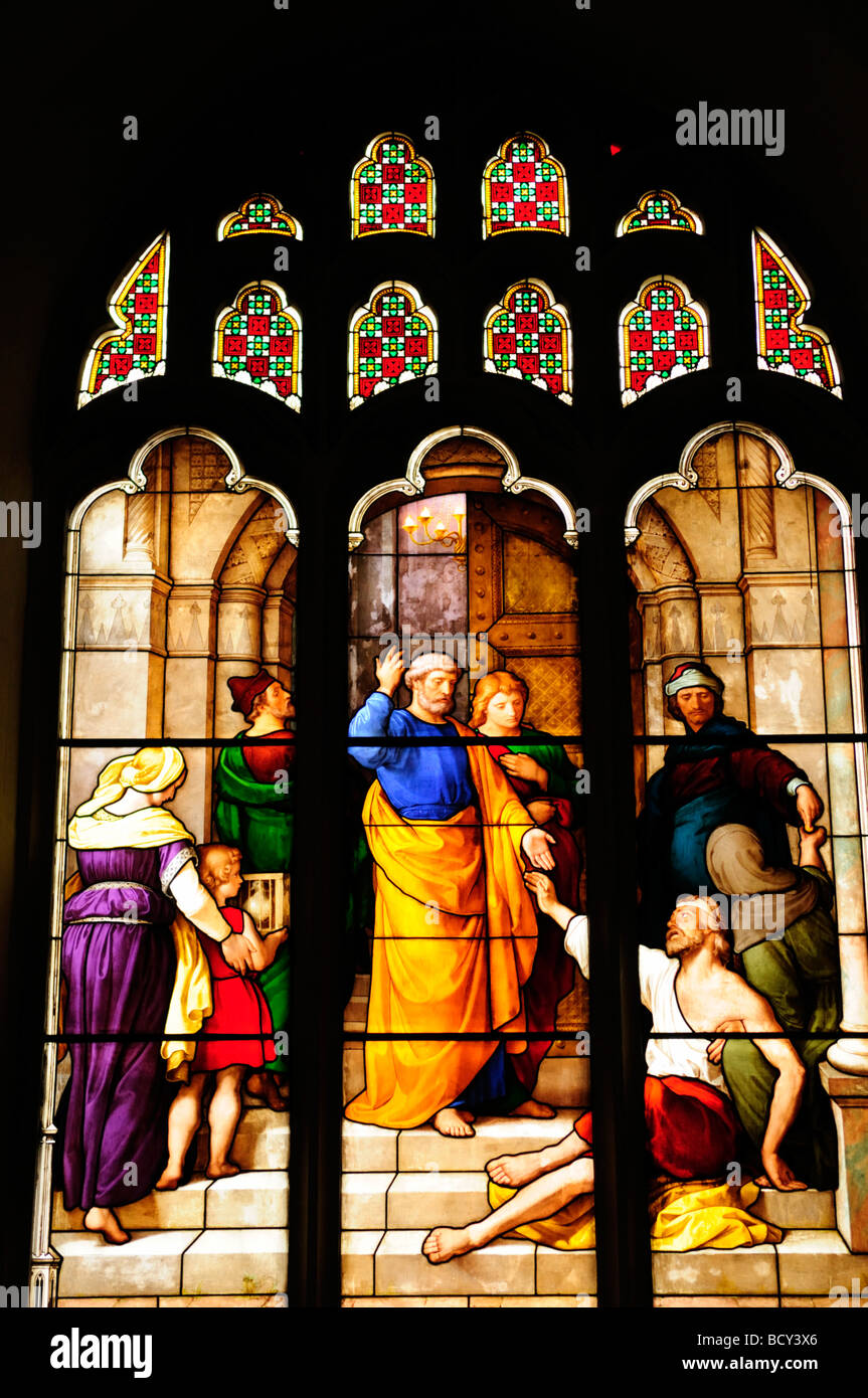 Stained Glass Window in Peterhouse College Chapel, Cambridge England UK Stock Photo