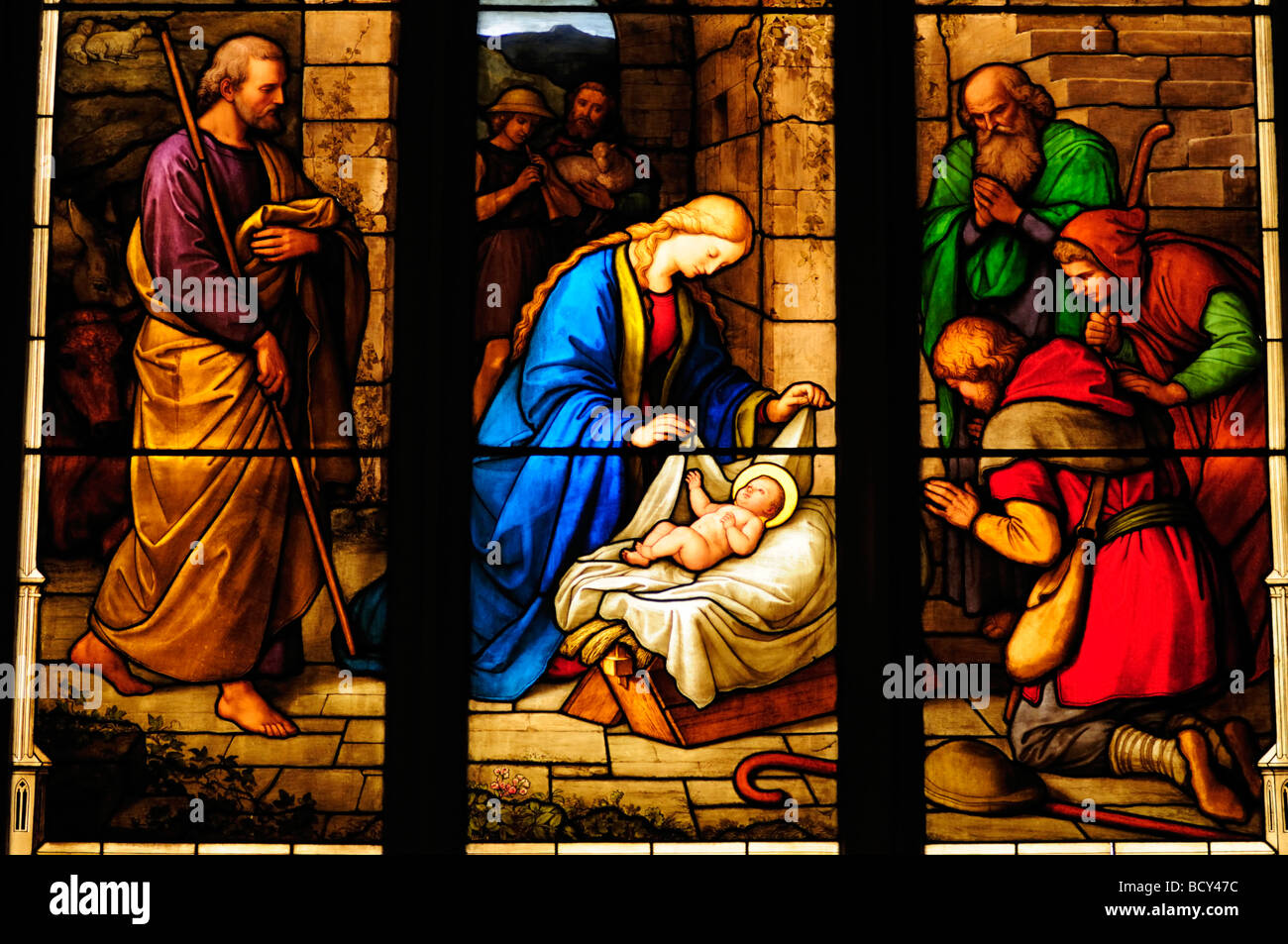 Detail of  Stained Glass Window depicting the Nativity in Peterhouse College Chapel, Cambridge England UK Stock Photo
