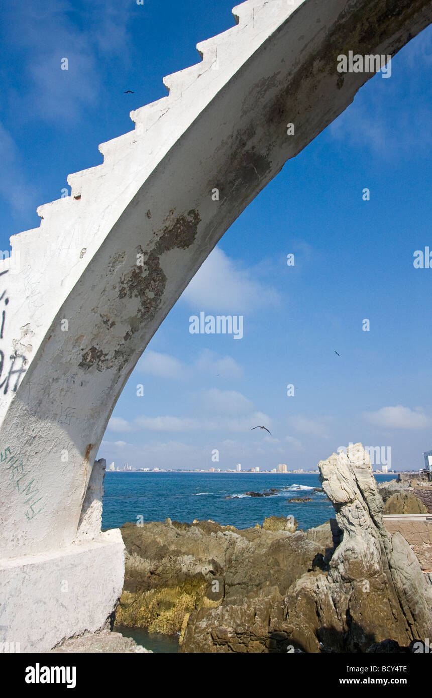 Concrete steps leading up to platform where local men dive into water for tourists along the Malecon in Mazatlan, Mexico Stock Photo