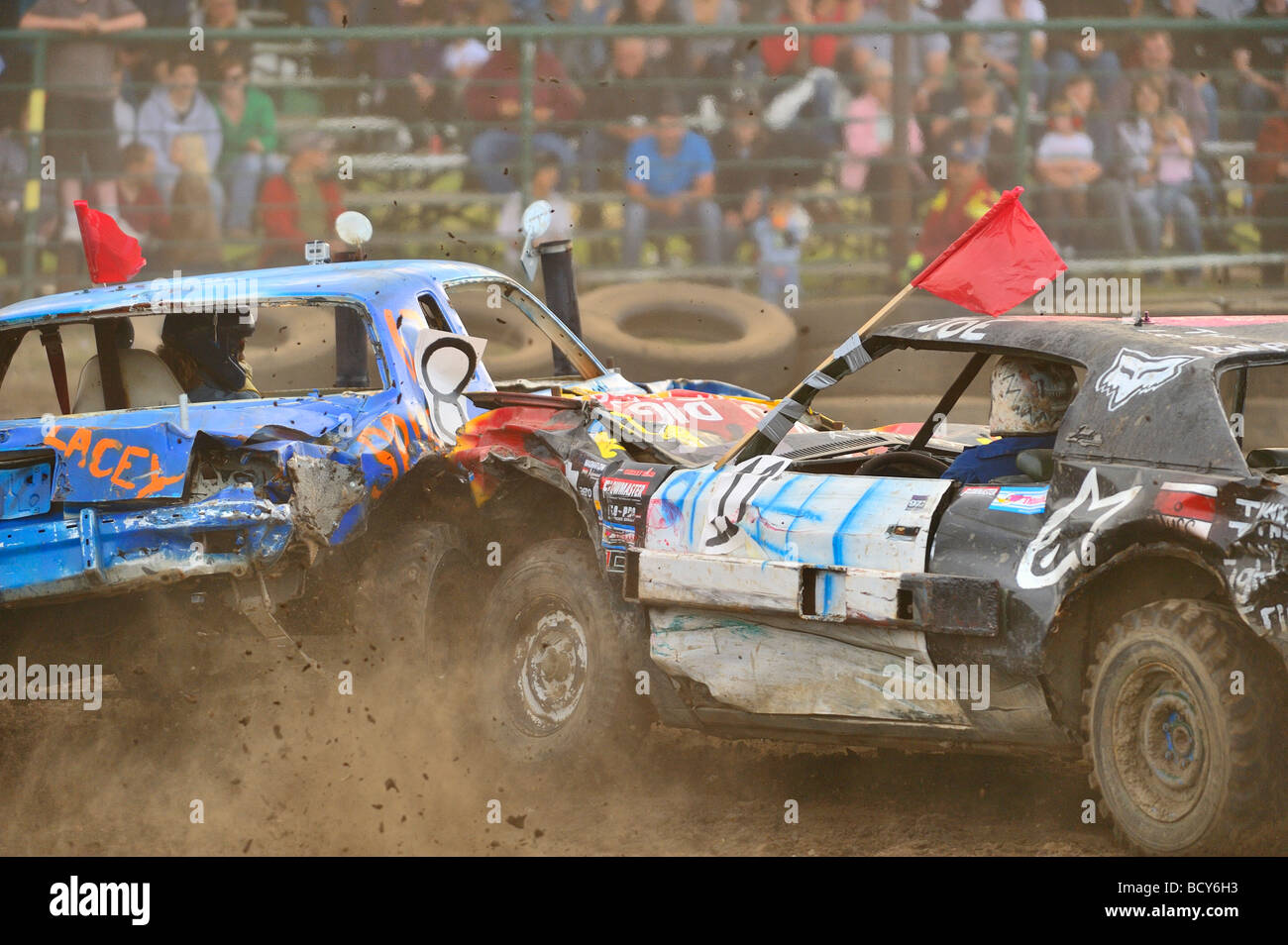 Two cars smash into each other at a demolition derby event Stock Photo