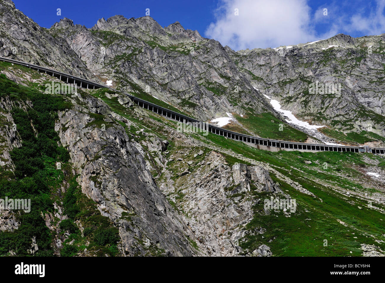 New Gotthardpass Road leading through an open tunnel on the mountain