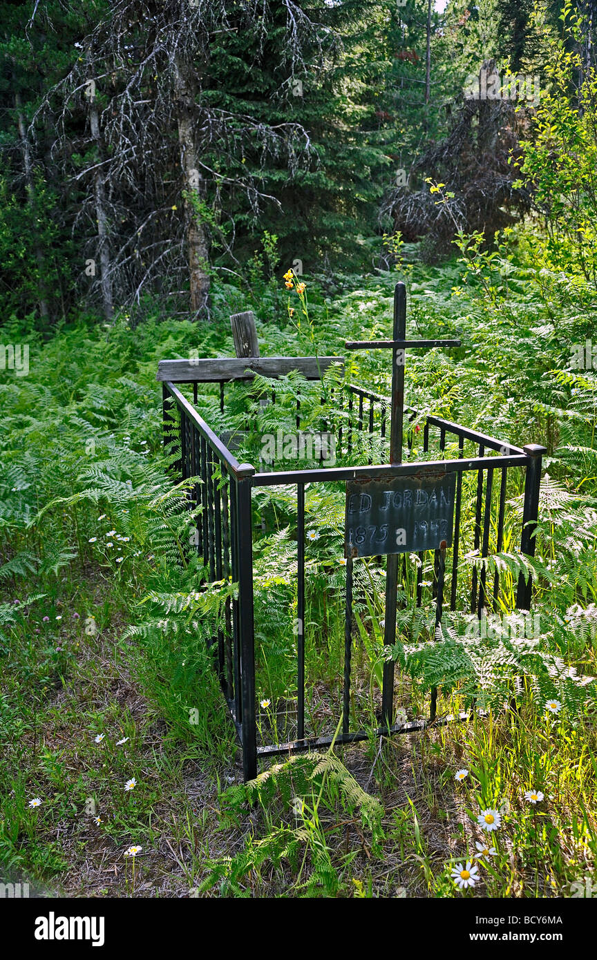 A grave site of an early Canadian pioneer in a wooded area in southern British Columbia Canada Stock Photo