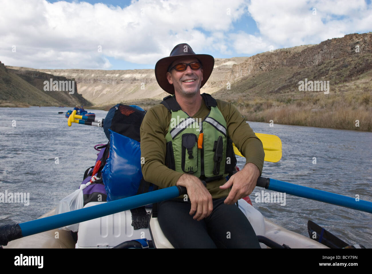 RAFTING GUIDE TODD LOVELL rows down the wild and scenic OWYHEE RIVER