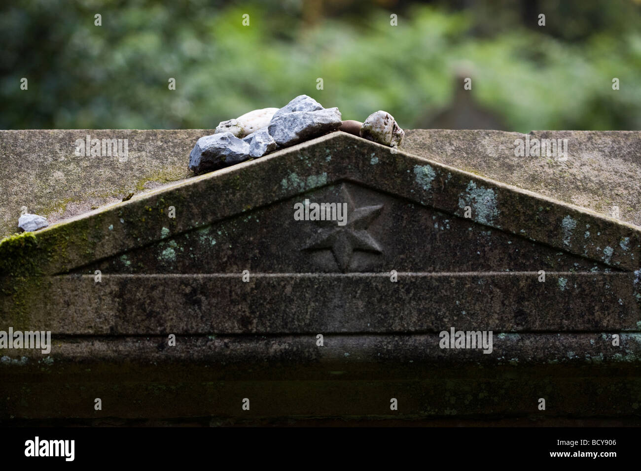 stones left by mourning visitors on tombstone at abandoned jewish cemetery, Essen-Kettwig, Germany Stock Photo