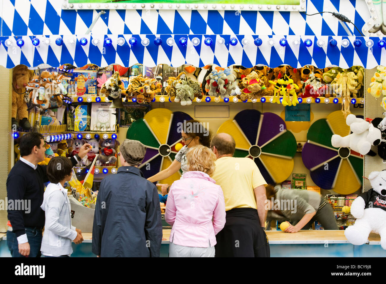 ball throwing game at fairground booth Stock Photo Alamy