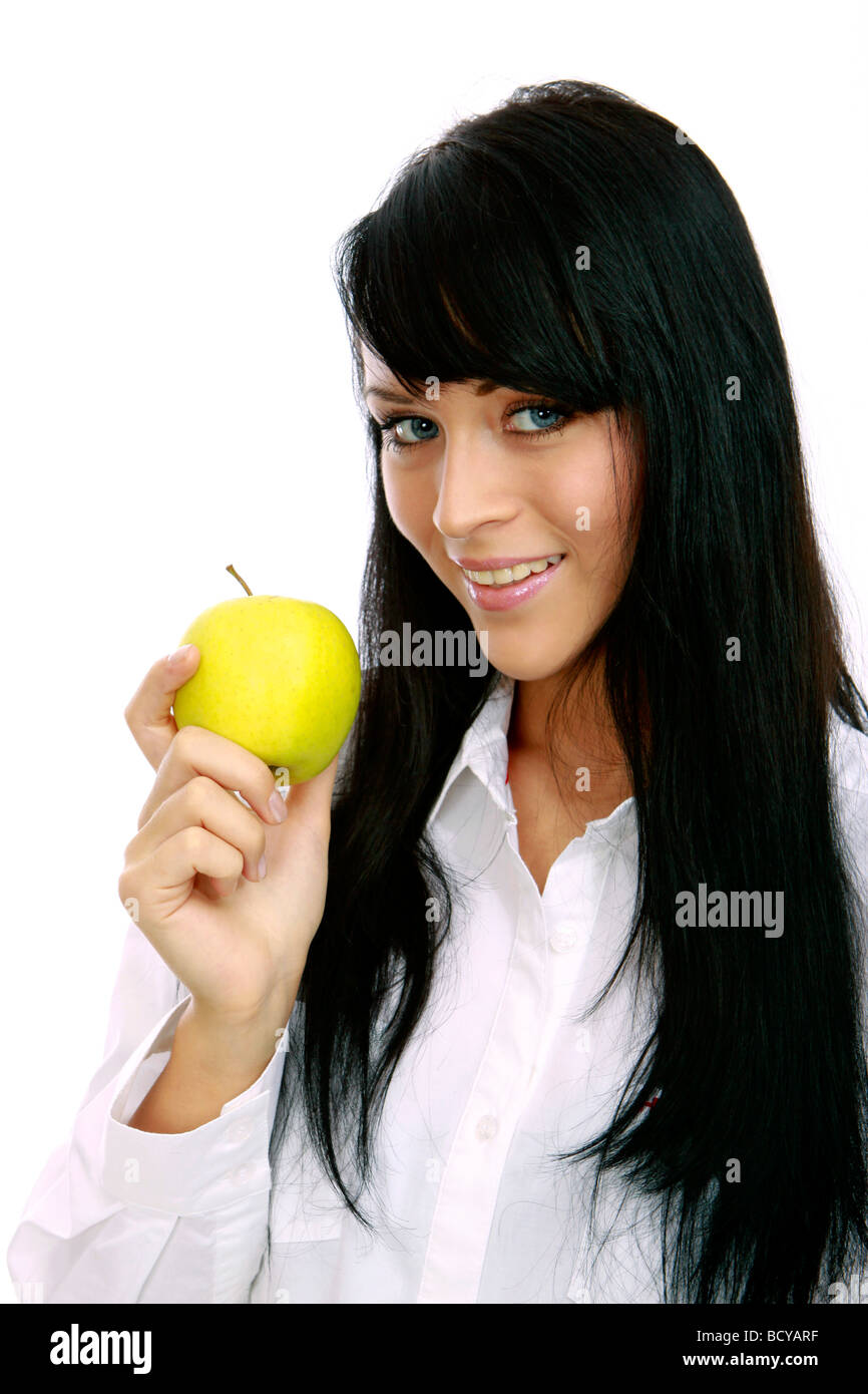 junge Frau mit Apfel girl holding a green apple Stock Photo