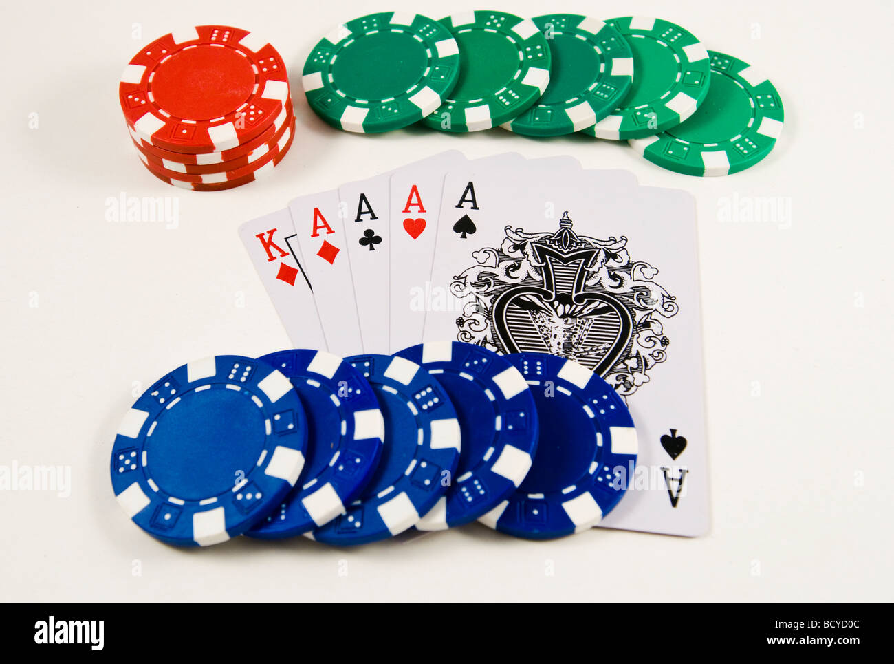 Playing cards and gambling chips on a white background Stock Photo Alamy
