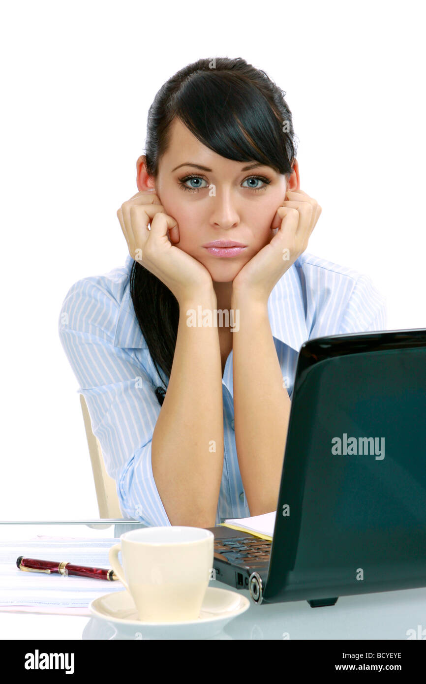 junge gestresste Geschaeftsfrau mit Laptop im Buero frustrated young businesswoman in the office Stock Photo