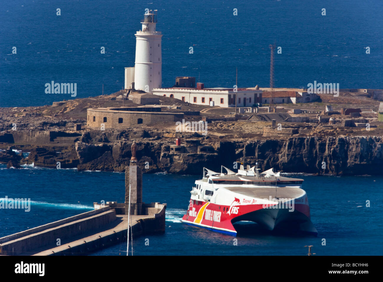 Tarifa Tangier ferry arrives back to Tarifa harbour Stock Photo