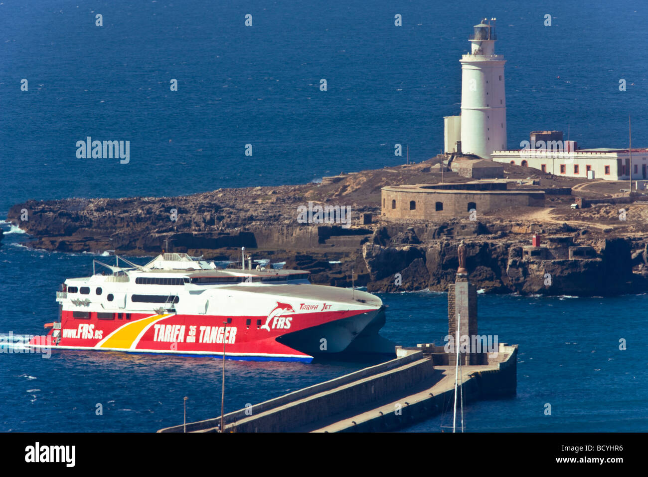 Tarifa Tangier ferry arrives back to Tarifa harbour Stock Photo
