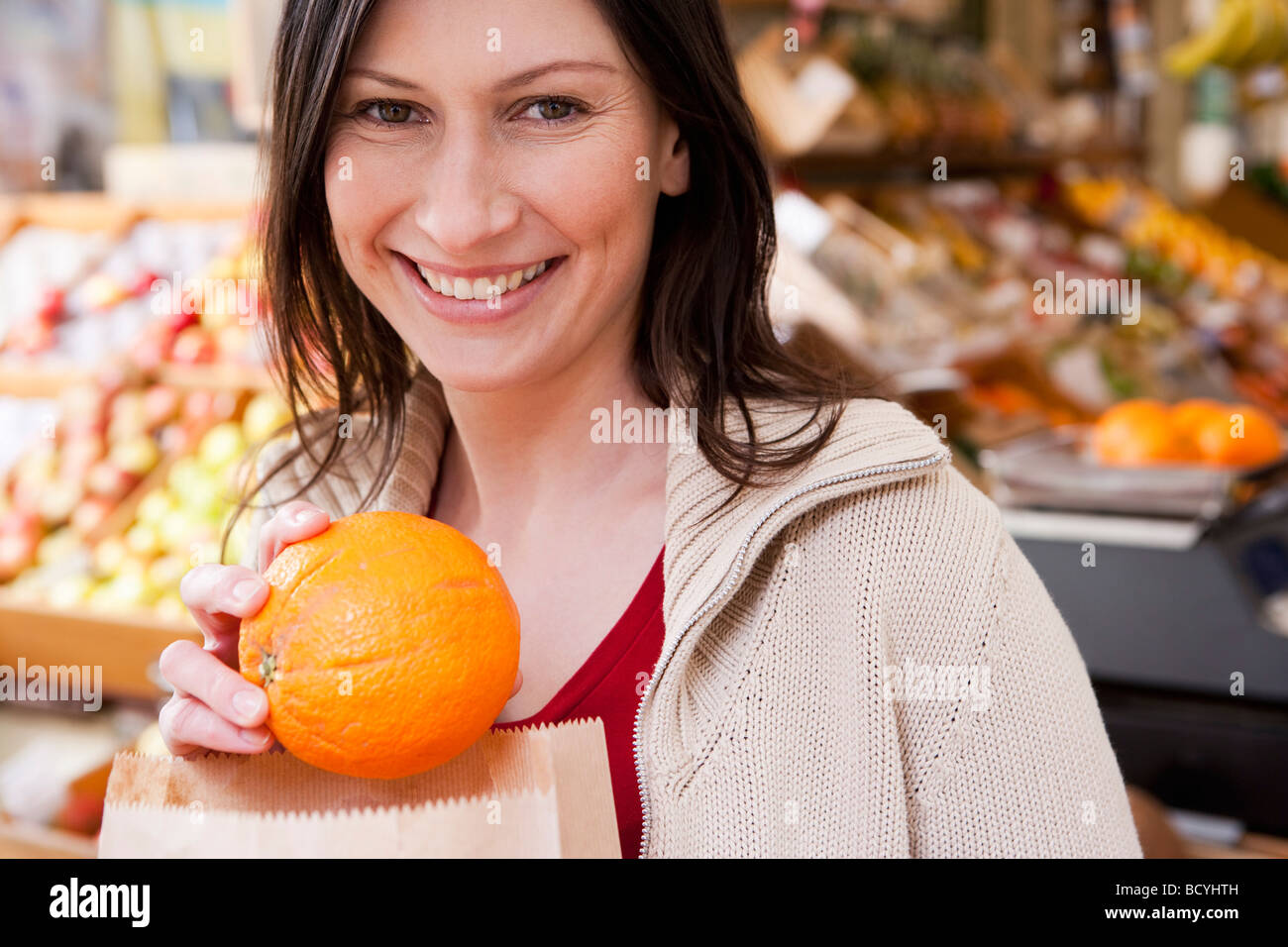 Woman holding small pumpkin Stock Photo