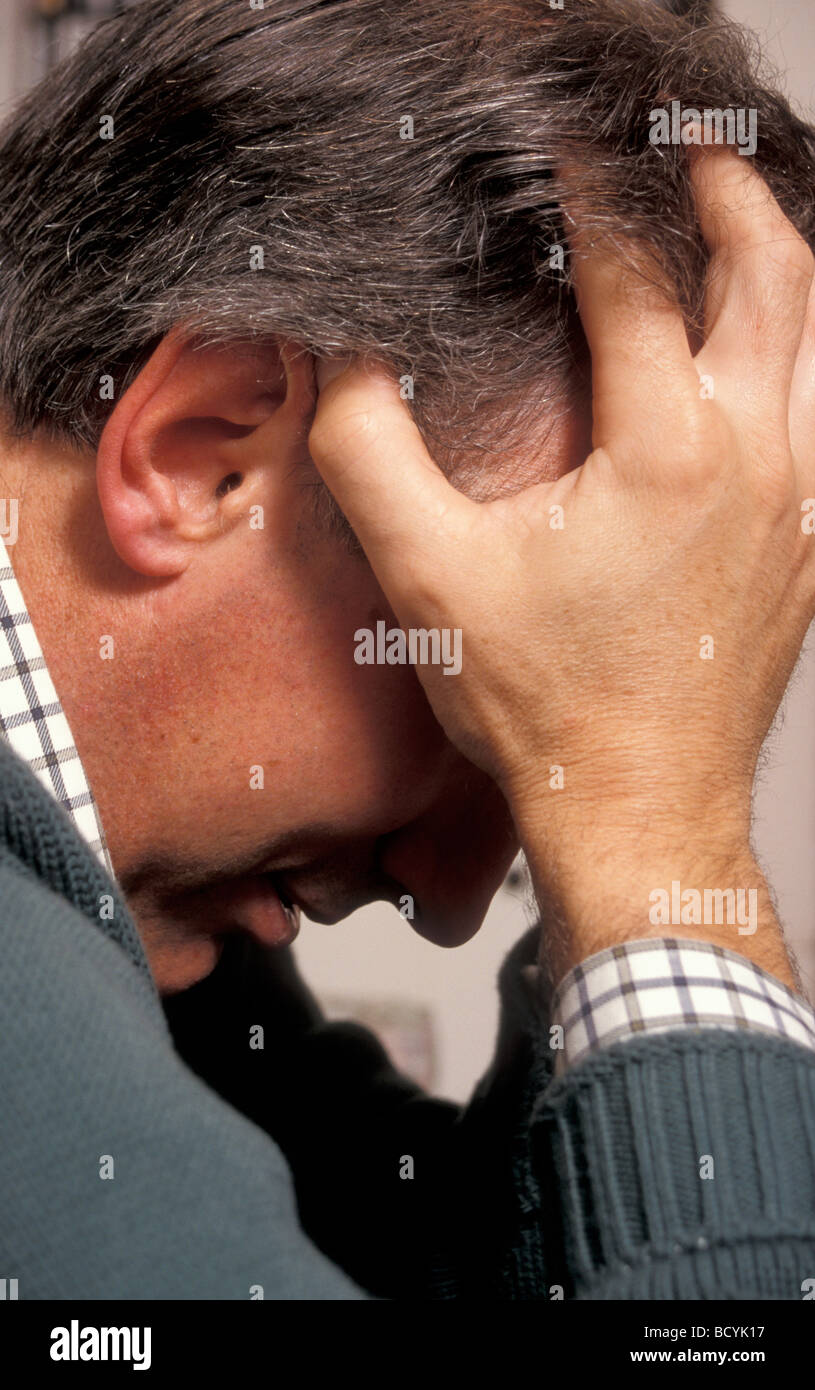 middle aged man in crisis Stock Photo