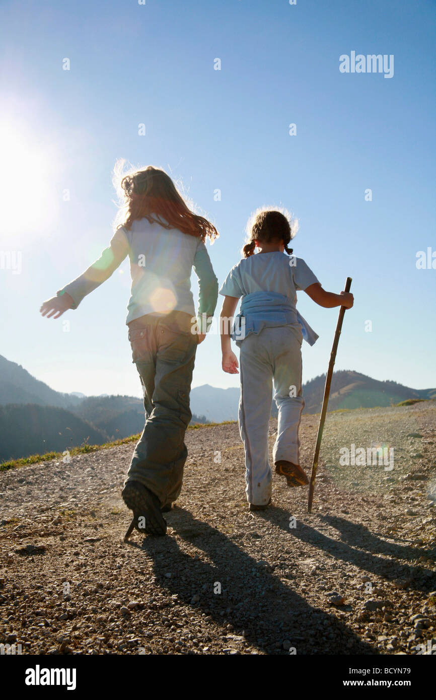 Girls hiking on Mountain Stock Photo