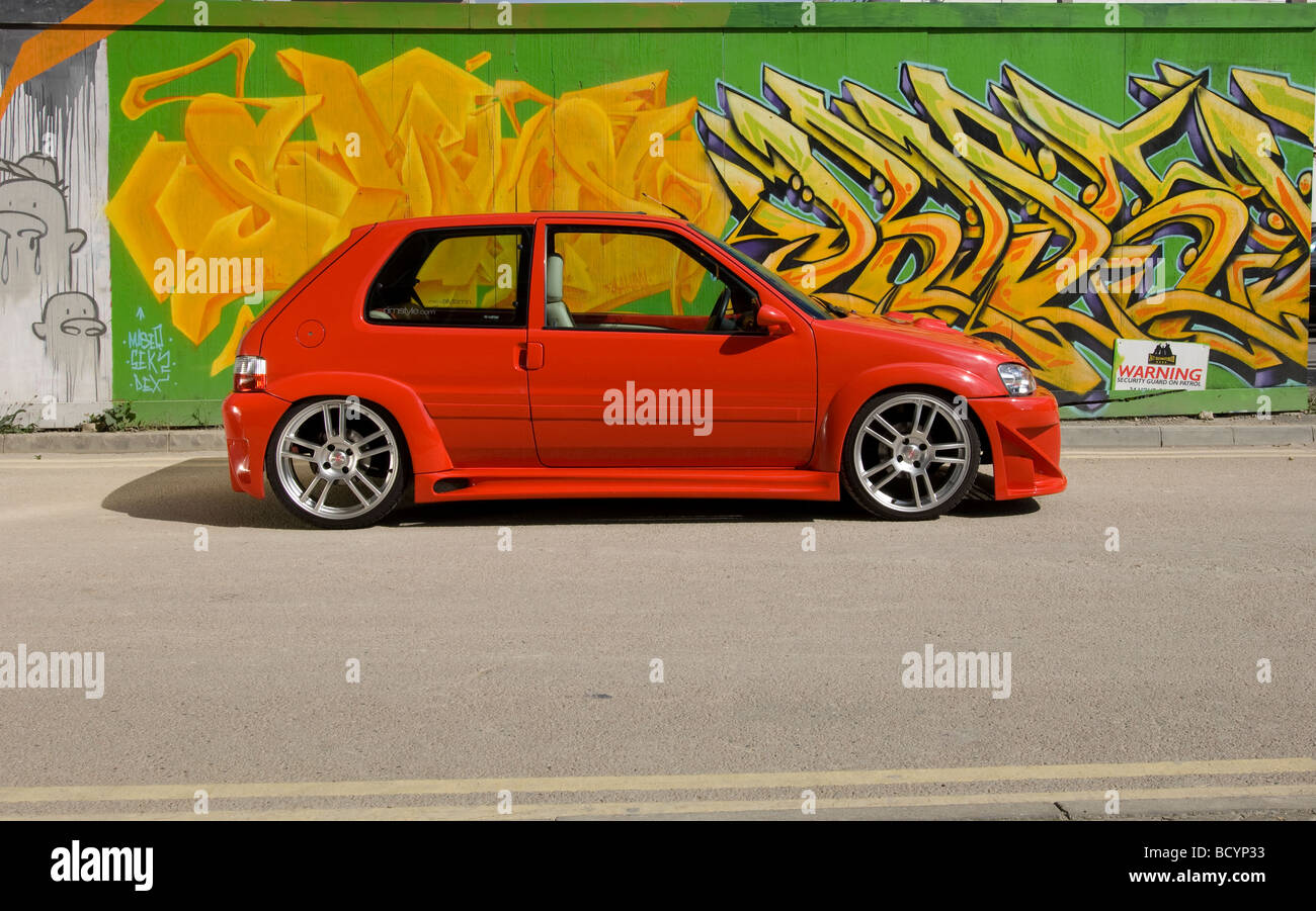 modified modded car - French hatchback Peugeot 106 lowered with body kit Stock Photo