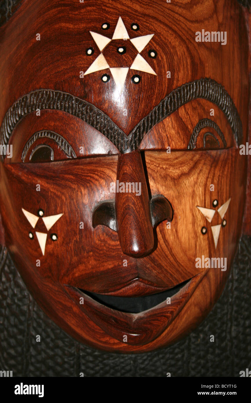 Traditional Gambian Carved Wooden Mask Stock Photo