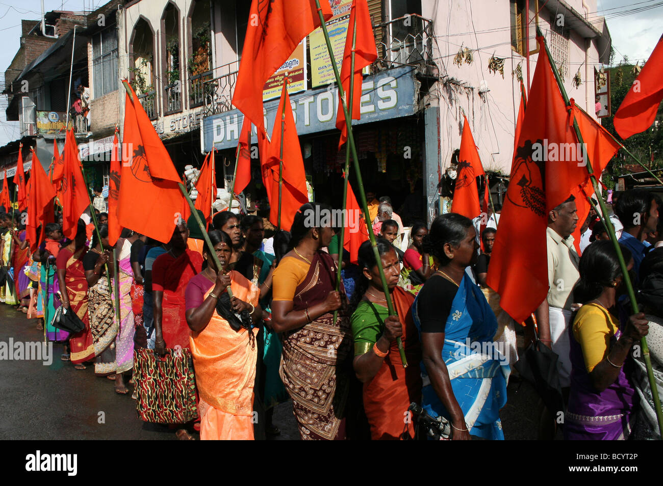 Indian Women Holding Flags At A Street Demonstration, Kerala State Stock Photo