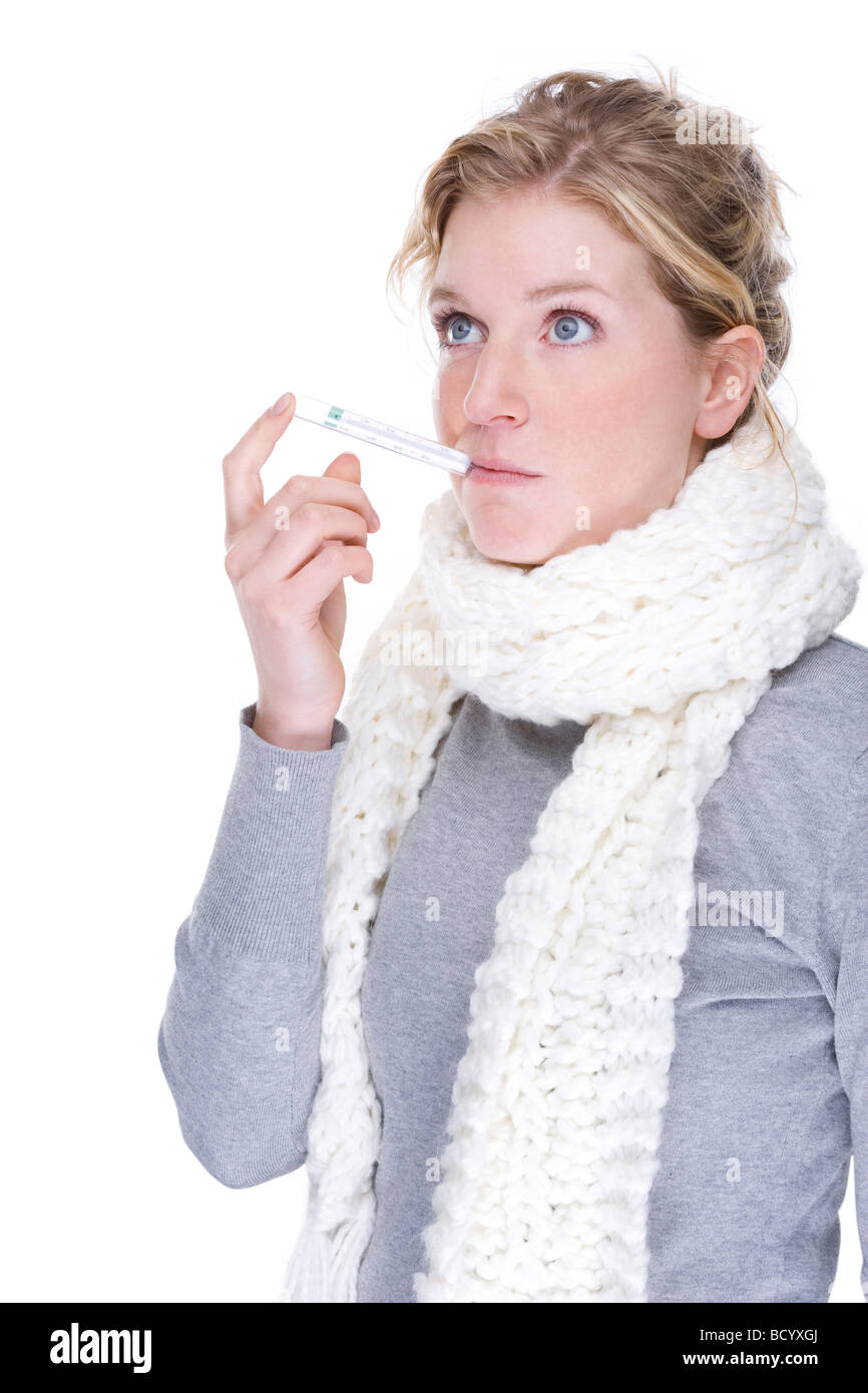 Full isolated portrait of a beautiful caucasian woman with clinical thermometer Stock Photo