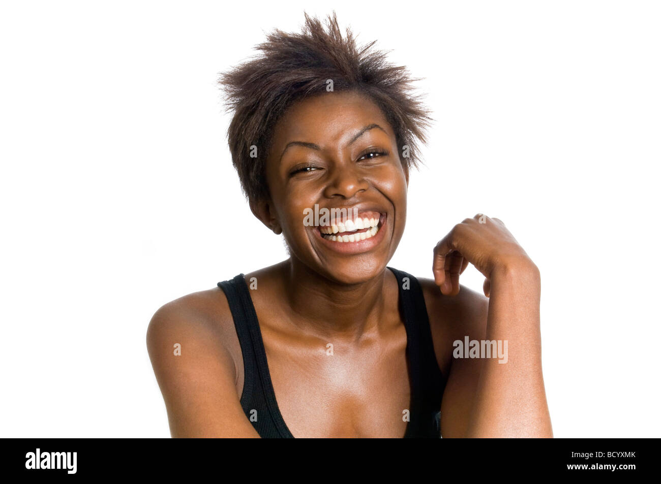 Horizontal close up studio portrait of an attractive African woman ...