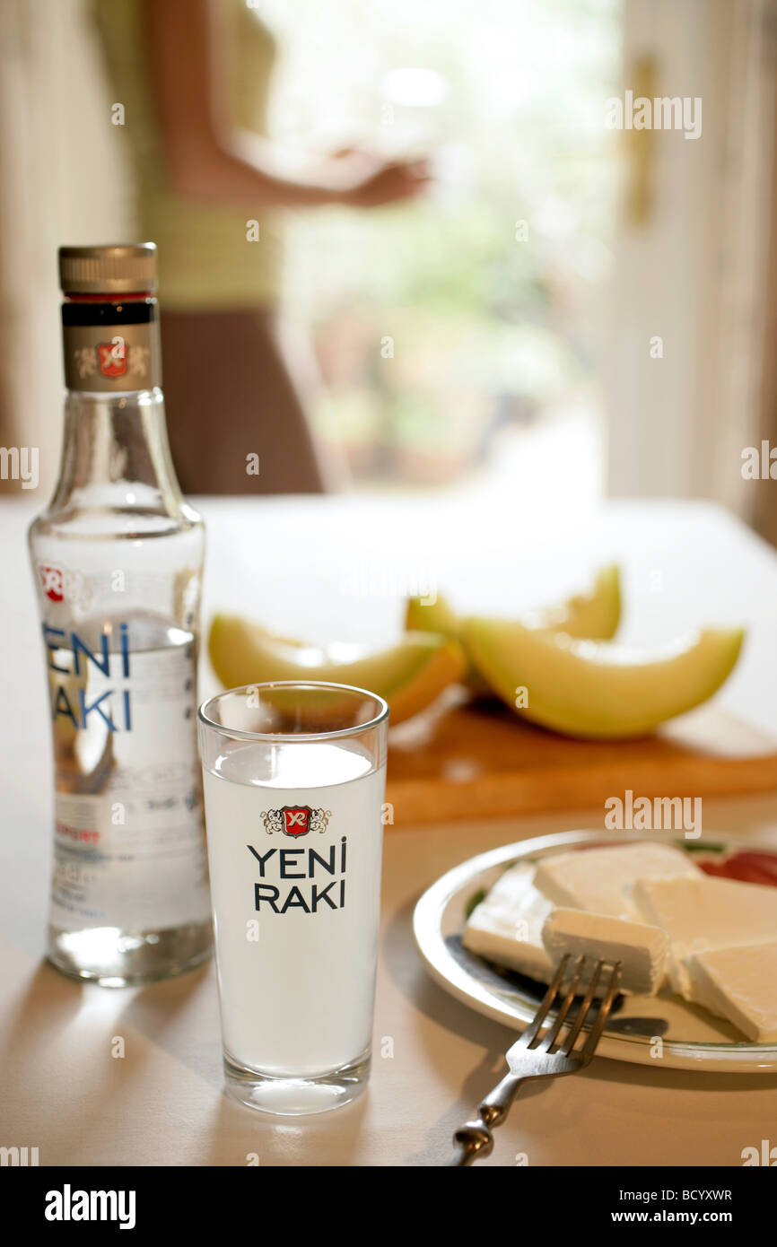 Turkish meze: raki accompanied by white feta cheese and melon Stock ...