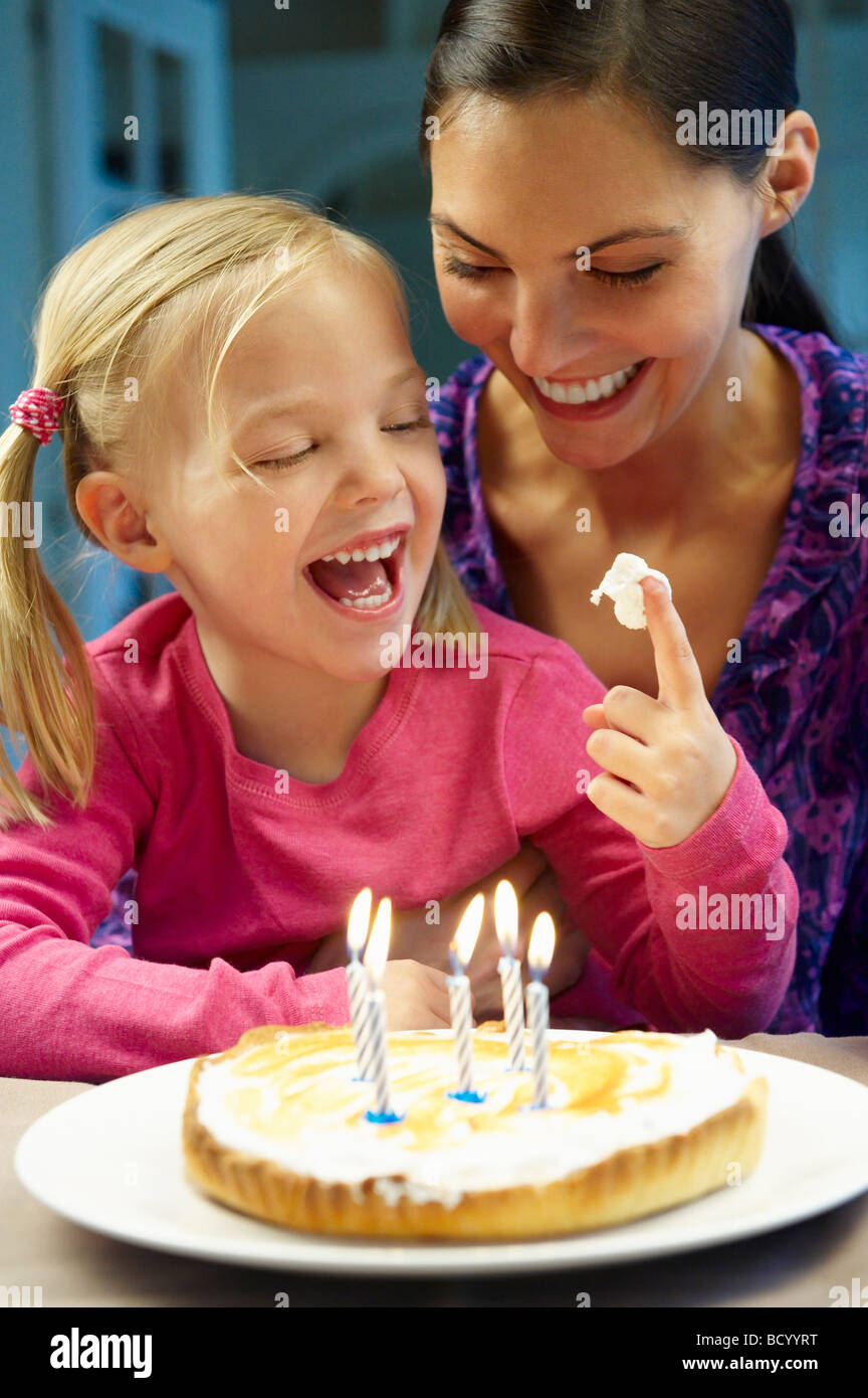 Mother and daughter celebrating birthday Stock Photo