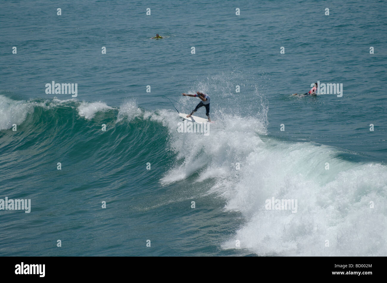 Kelly Slater competes at the U.S. Open Surf competition, Huntington