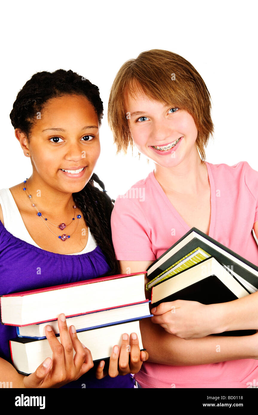 Isolated portrait of black teenage girl holding text books Stock Photo