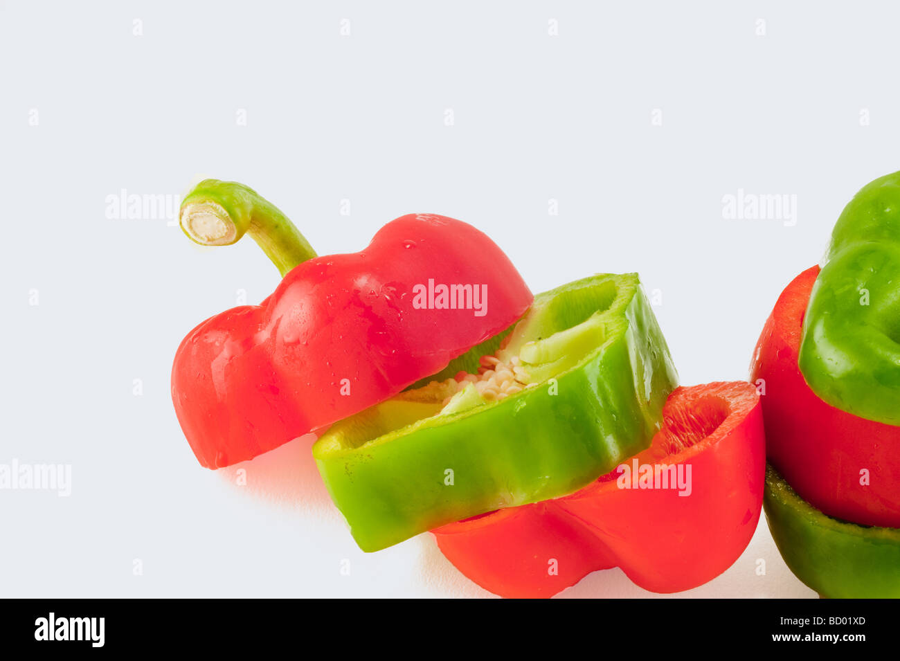 red and green bell pepper sliced and stacked in alternating colors ...