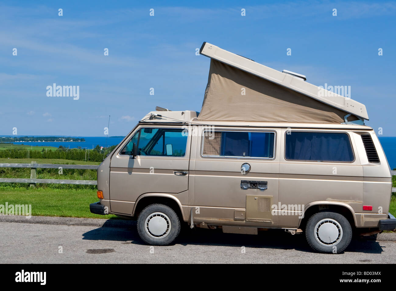 https://c8.alamy.com/comp/BD03MX/a-westfalia-with-his-pop-top-open-is-pictured-against-the-lac-st-jean-BD03MX.jpg