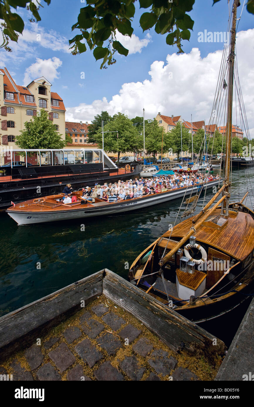 Sightseeing boat in Christianshavn canal, Copenhagen, Denmark, Europe Stock Photo