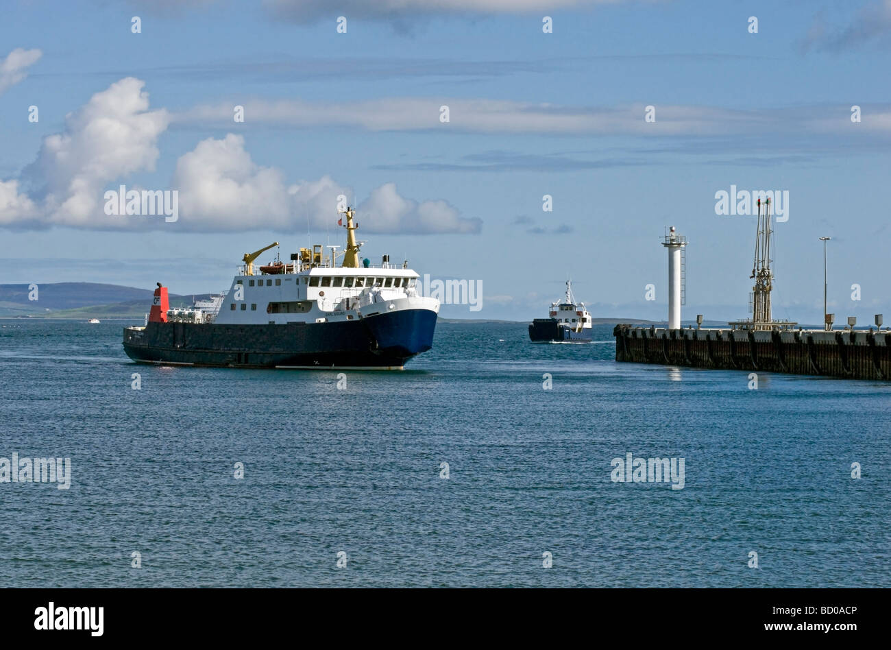 Car ferries Earl Sigurd and Sharpinsay returning to Kirkwall harbour in Orkney Scotland on a