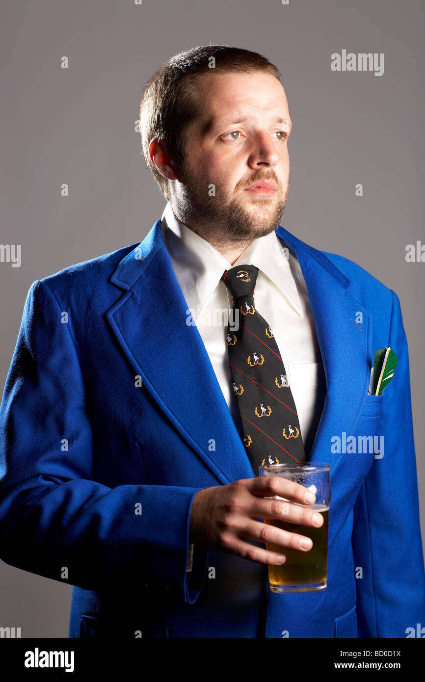Studio portrait, darts player in formal uniform Stock Photo