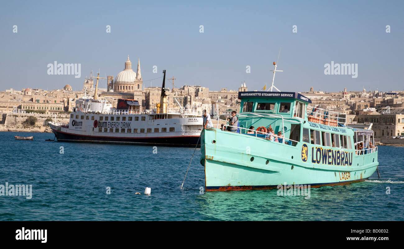 The Valletta to Sliema ferry docks in Sliema harbour, Malta Stock Photo