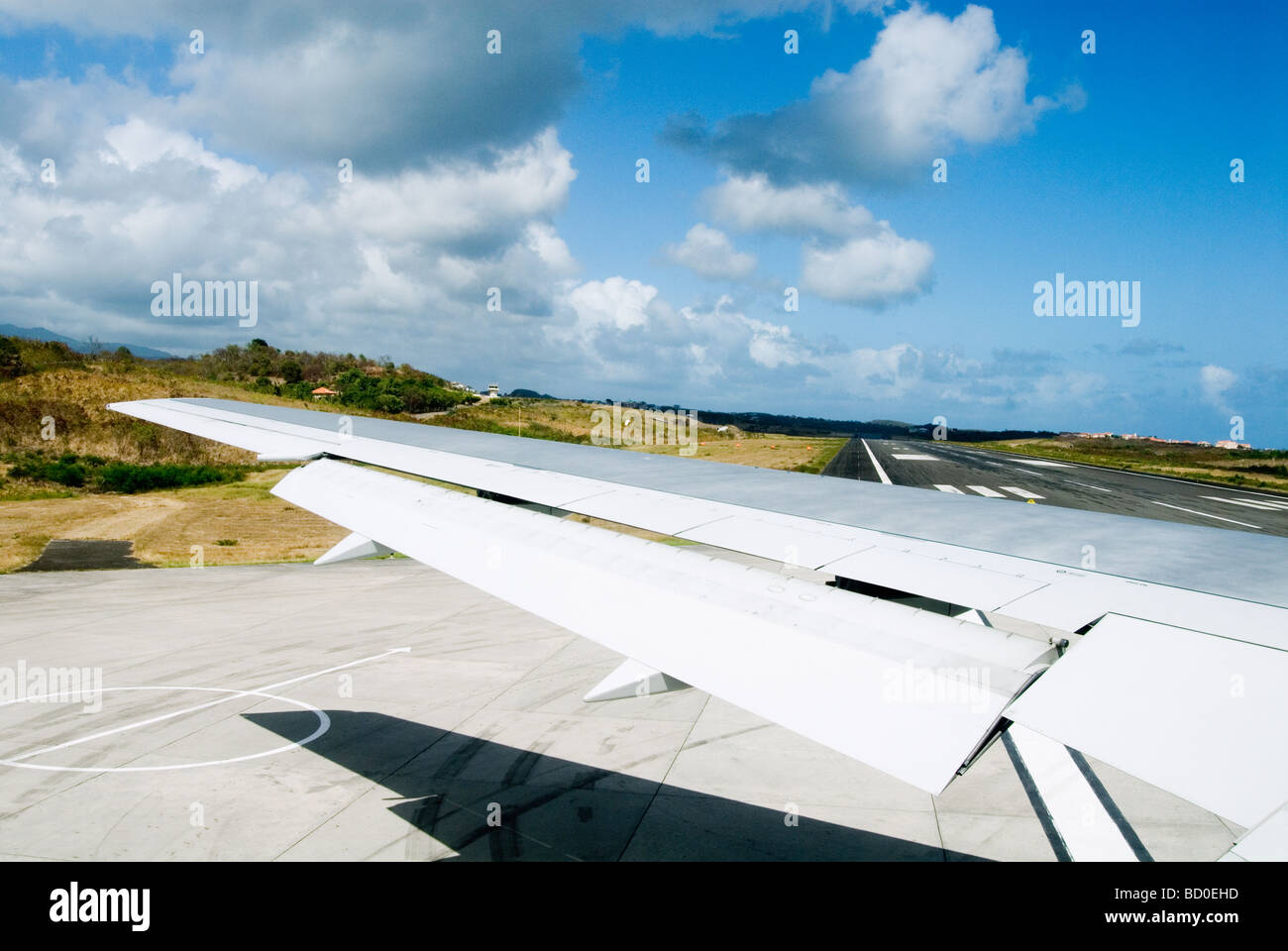 Airplane on the airport of the caribbean island of Grenada. Stock Photo