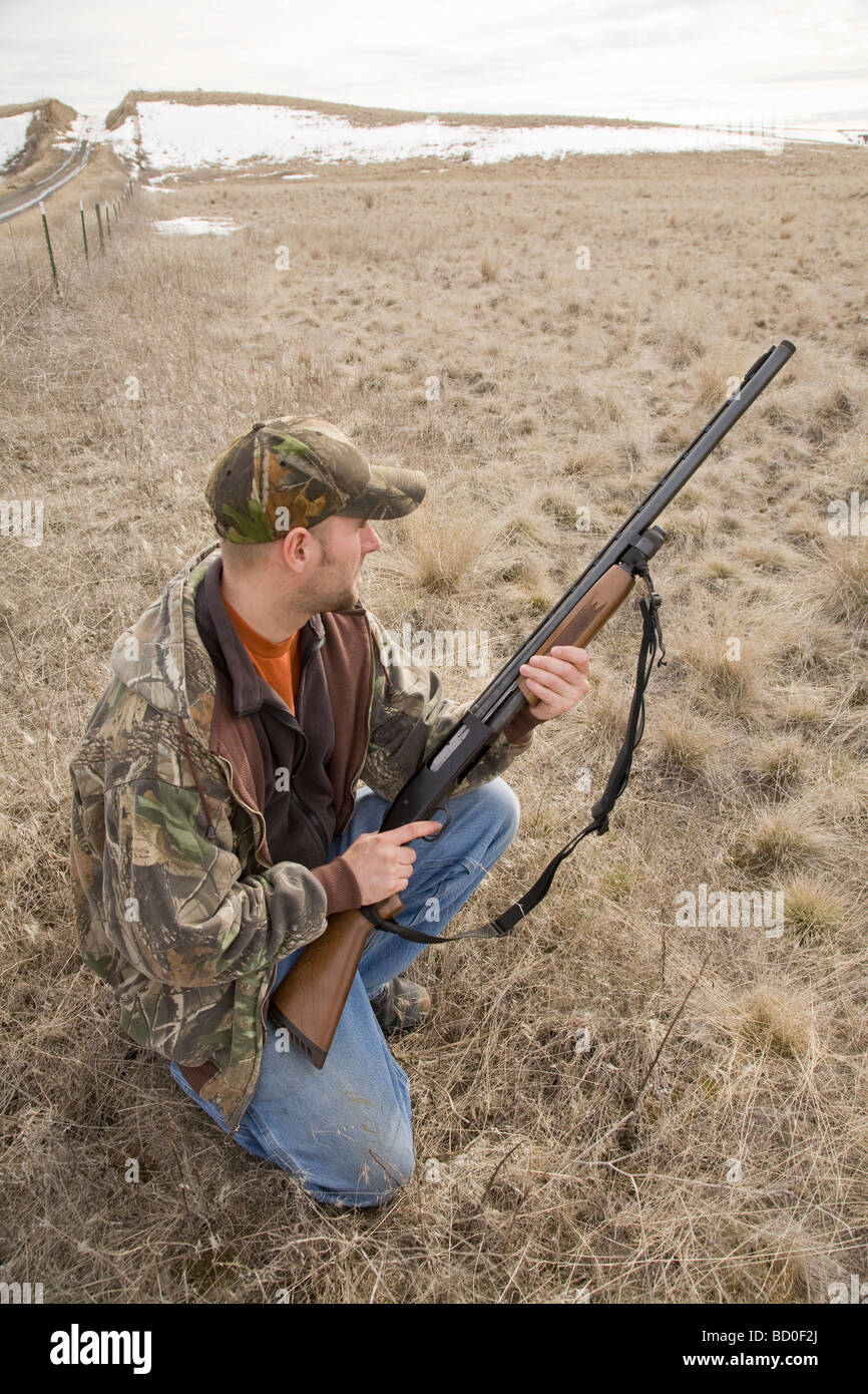 Man with Remington 12-gauge shotgun, Davenport, Washington. Stock Photo