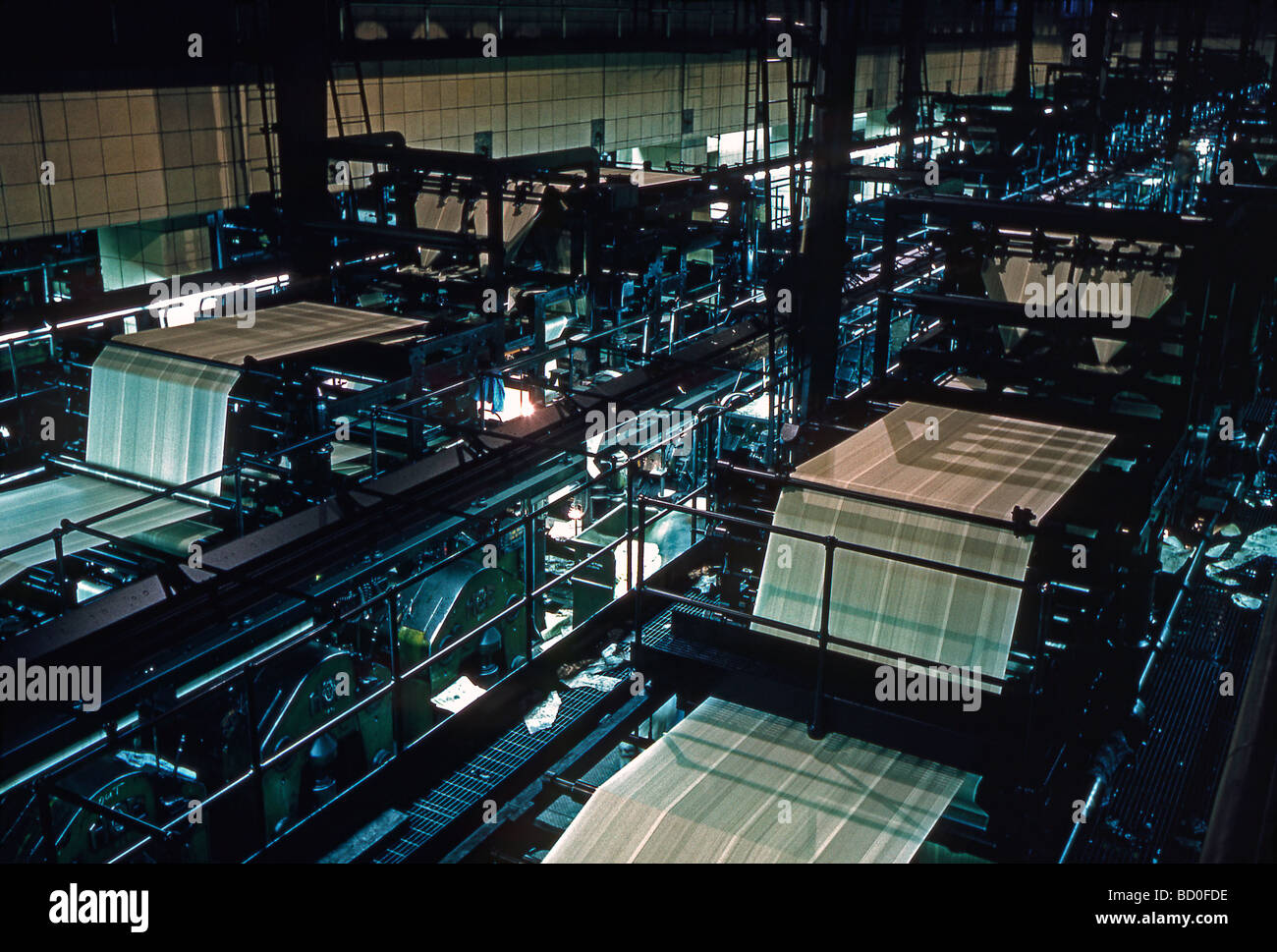 Printing presses rolling producing the local afternoon paper, the Los Angeles Mirror-News, in the late 1950s Stock Photo