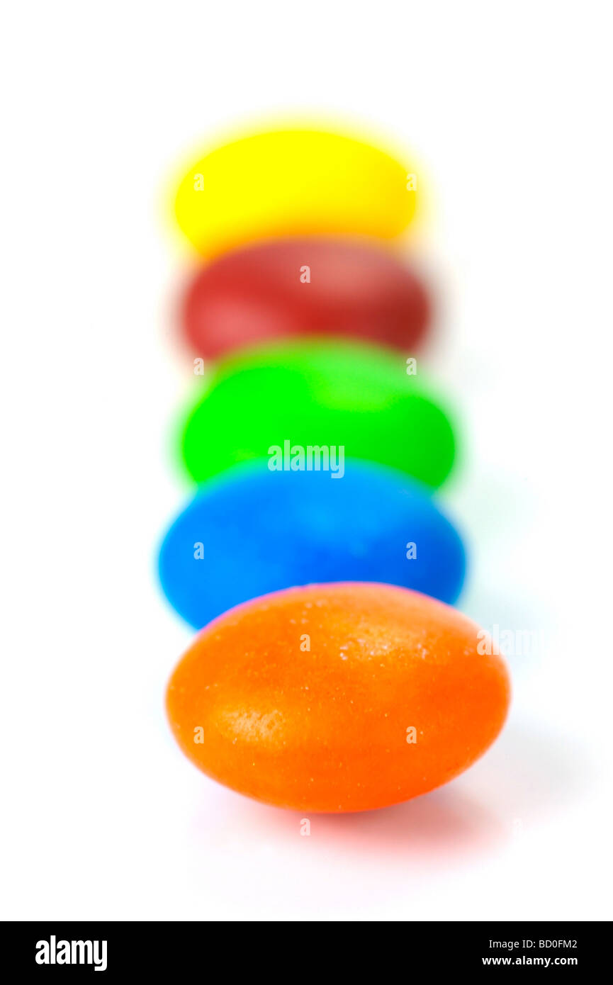 Candy coated chocolate isolated against a white background Stock Photo Alamy