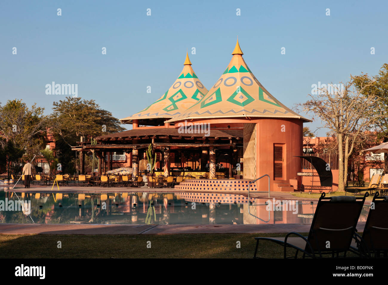 Swimming pool and barbecue bar at the Zambezi Sun Hotel at Victoria Falls, near Livingstone, Zambia, Africa Stock Photo