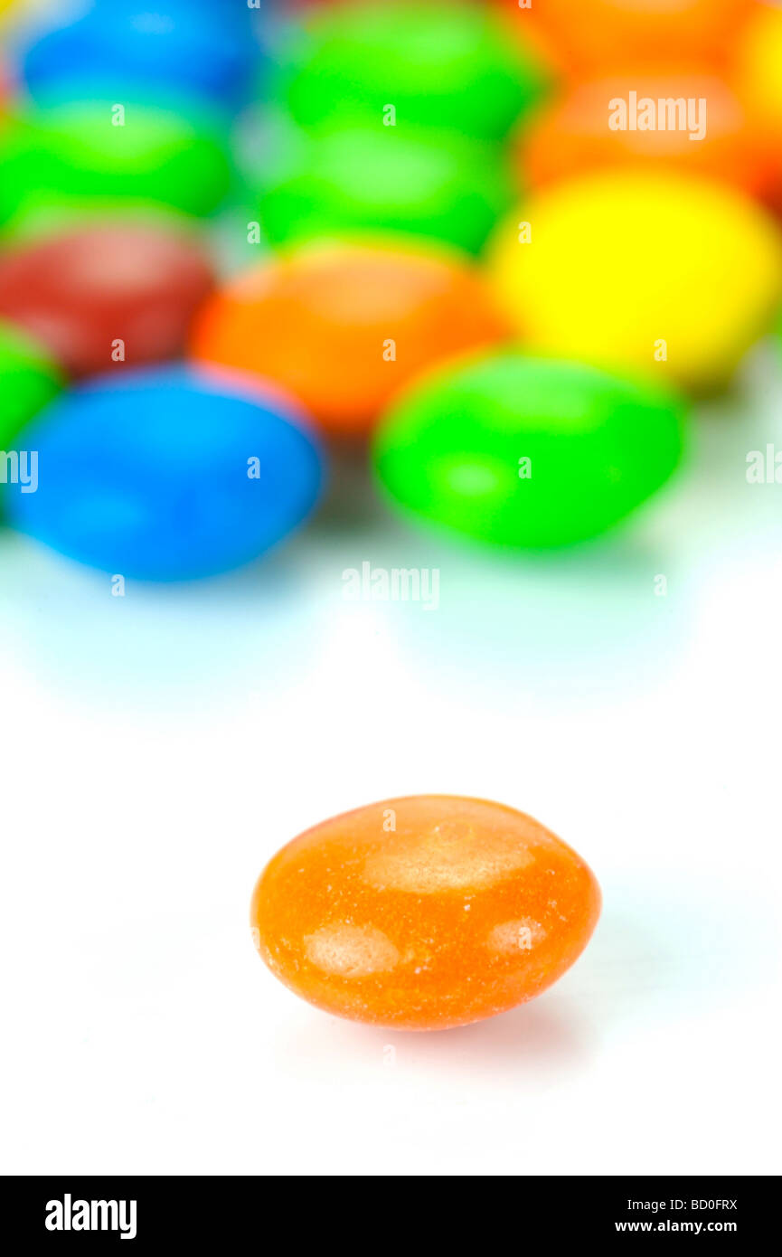 Candy coated chocolate isolated against a white background Stock Photo ...
