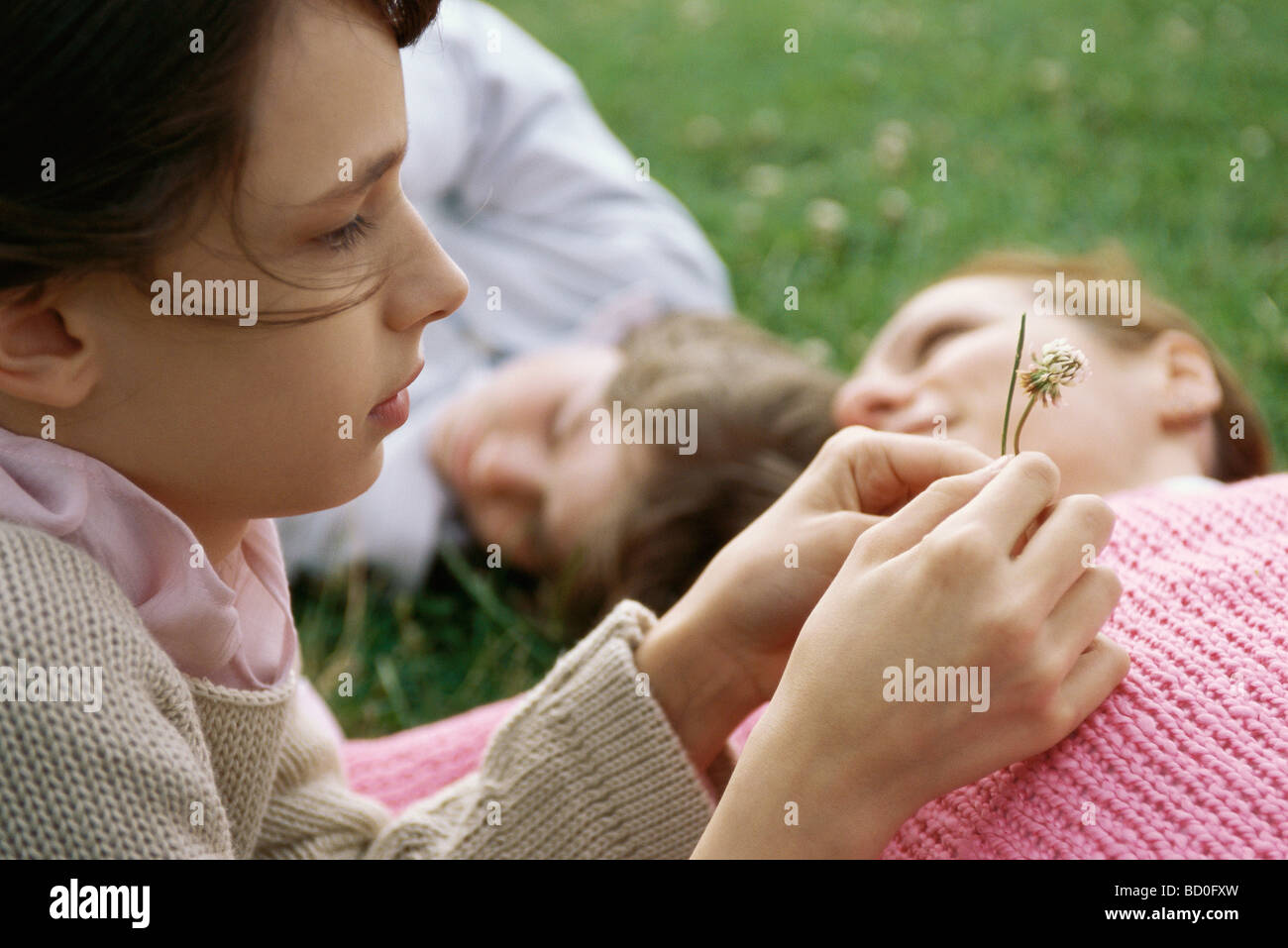 Preteen girl lying on back hi-res stock photography and images - Alamy