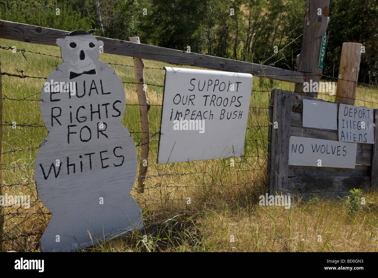 Hand painted signs of a local resident of Boulder Valley. The signs show racist and strong political views. Stock Photo