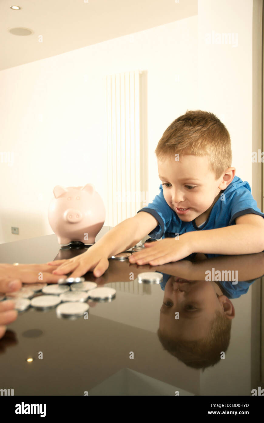 boy grabbing money Stock Photo