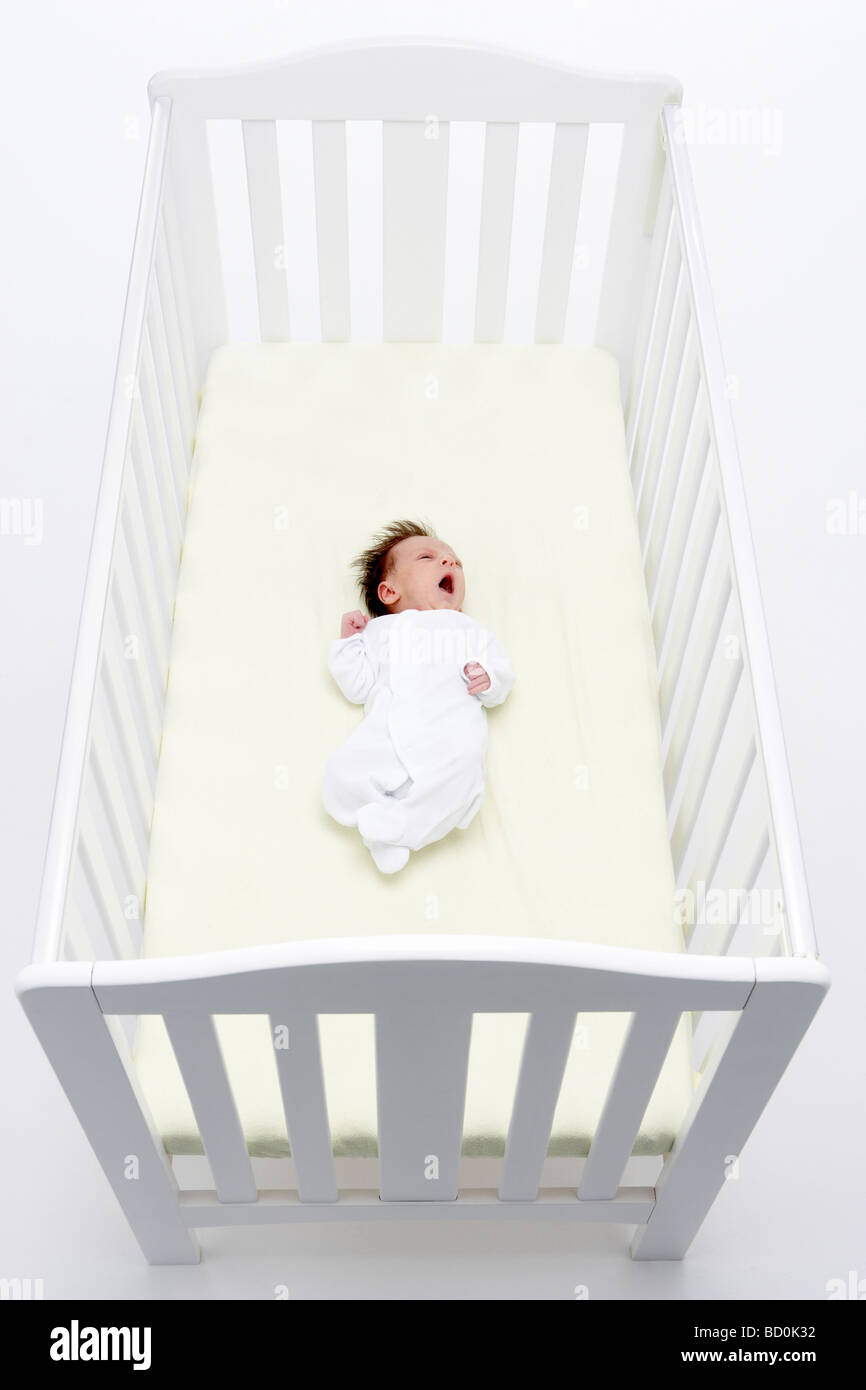 Newborn Baby In Cot Stock Photo Alamy