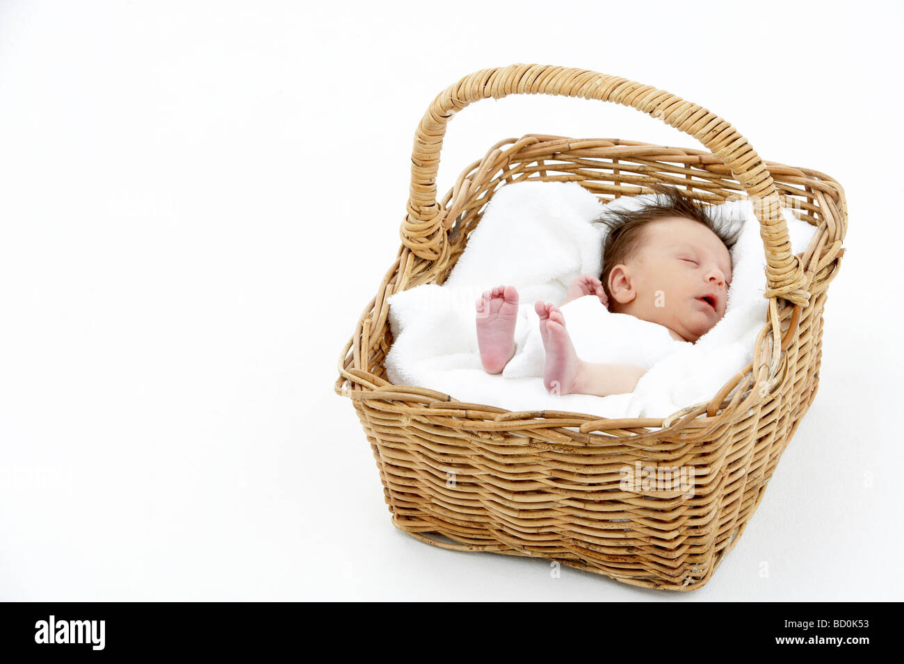 Newborn Baby Sleeping In Basket Stock Photo Alamy