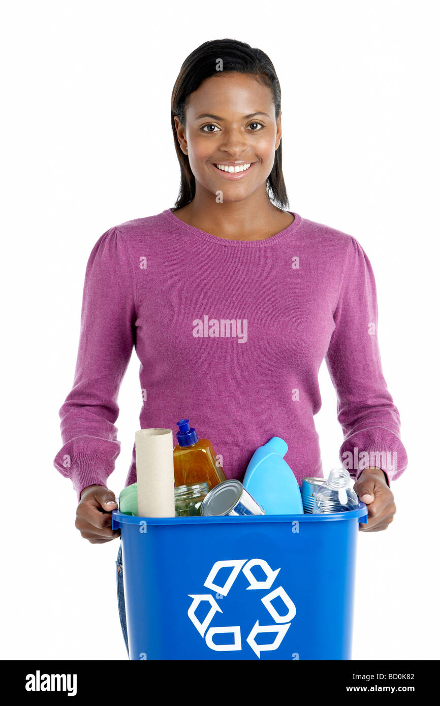 Woman Carrying Recycling Bin Stock Photo