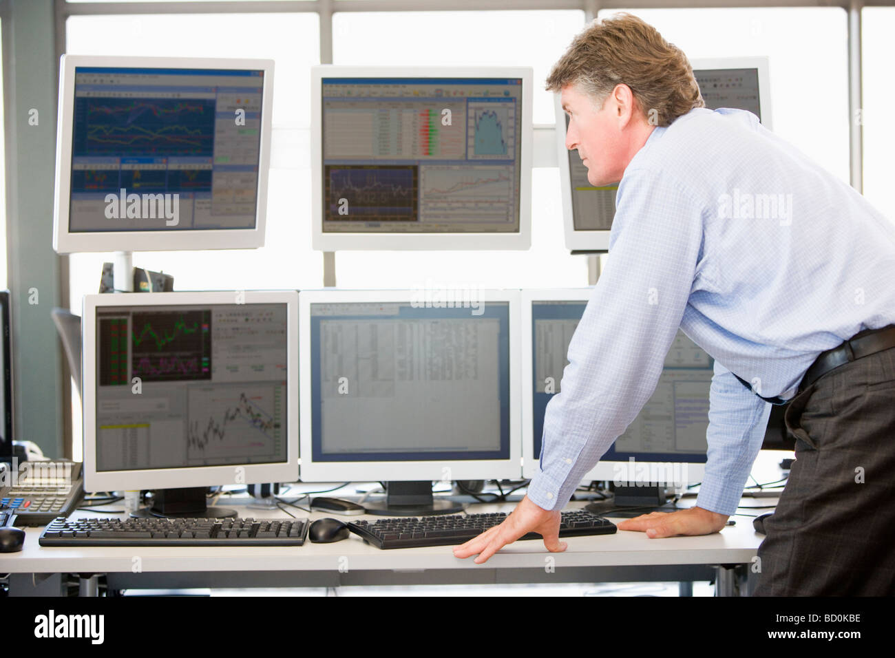 Stock Trader Examining Computer Monitors Stock Photo Alamy