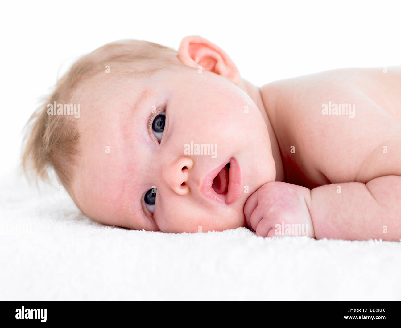 Newborn Baby Girl On Towel Stock Photo