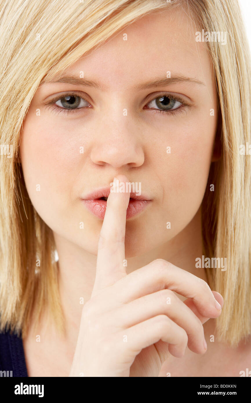 Studio Portrait Of Surprised Teenage Girl Stock Photo - Alamy