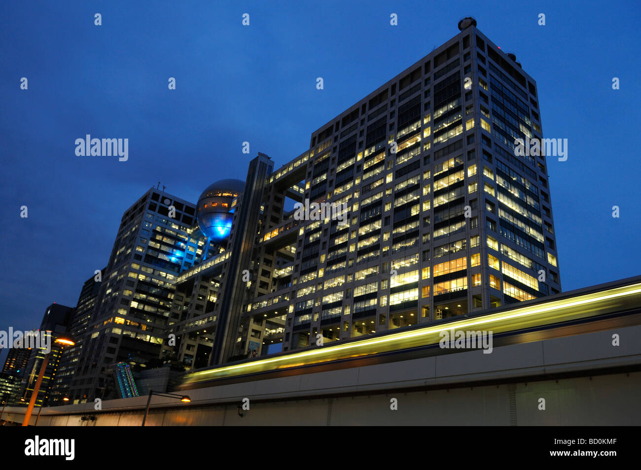 The Fuji TV Building with its suspended dome of titanium in Odaiba district Tokyo Japan Stock Photo