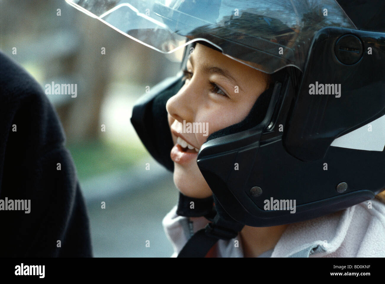 Girl wearing motorcycle helmet Stock Photo - Alamy