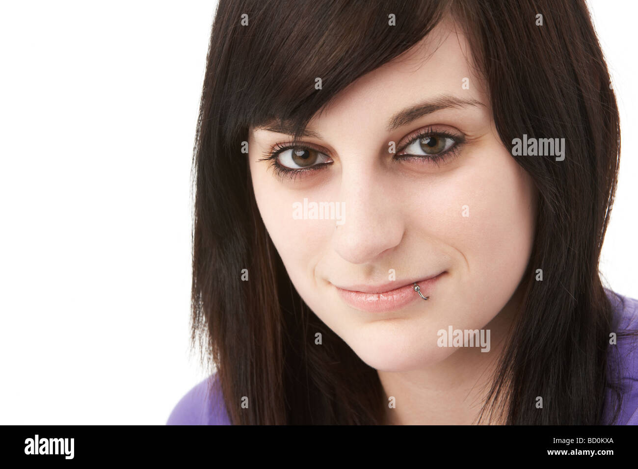 Studio Portrait Of Smiling Teenage Girl Stock Photo - Alamy